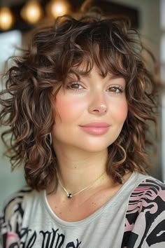 The Best Curly Hairstyles & Haircuts of 2024 Artsy Curly Hairstyles, Shoulder Length Wavy Hair With Fringe, New Curly Haircuts, Long Wavy Layered Hairstyles, Above Shoulder Curly Haircuts, Wavy Medium Shag Haircut, Long Bob Curly Haircuts, Shoulder Length Curly Hair Hairstyles, Short Length Haircut Curly Hair