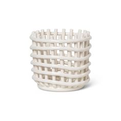 a white basket that is made out of plastic