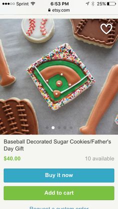 decorated cookies are arranged on a table with baseball, mitt and bat decorations in the background