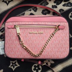 Nwt Michael Kors Jet Set Large Logo Pink Crossbody Bag. 9.5"W X 6.5"H X 2"D. The 4th And All Pictures After Are All More True To Color Pictures Of Bag Then First Three Pictures Due To Lighting. Designer Pink Shoulder Bag With Zipper Closure, Designer Pink Bag With Zipper Closure, Pink Crossbody Bag With Branded Hardware, Pink Travel Bag With Branded Hardware, Michael Kors Pink Travel Bag, Michael Kors Pink Crossbody Bag, Logo Pink, Pink Crossbody Bag, Color Pictures