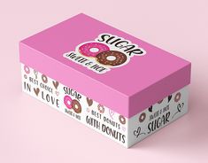 a pink box with donuts on it that says sugar sweet and i'm in love