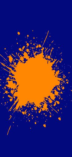 an orange paint splattered on a blue background