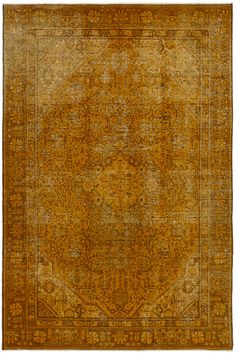 an antique rug with yellow and brown colors