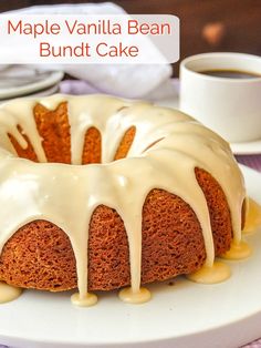 a bundt cake with white icing on a plate