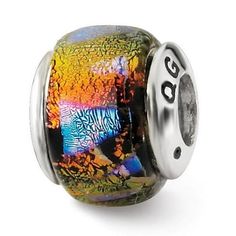 a glass bead with colorful designs on it