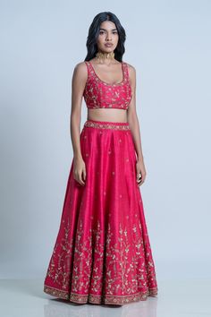 Pink raw silk floral embroidered lehenga with attached cancan. Paired with scoop neck padded blouse and dupatta.
Component: 3
Pattern: Embroidery
Type Of Work: Floral
Neckline: Scoop
Sleeve Type: Sleeveless
Fabric: Blouse and Lehenga: Raw Silk; Dupatta: Organza
Color: Pink
Other Details: 
Lehenga Length: 42 inches
Embroidered border dupatta
Tassel tie-up detailing
Note: The neckpiece worn by the model is not for sale
Occasion: Bride,Wedding - Aza Fashions Designer Satin Choli, Silk Sets With Floral Embroidery For Reception, Silk Choli With Floral Embroidery For Reception, Fitted Floral Embroidered Tissue Silk Sets, Fitted Floral Embroidery Silk Sets, Fitted Raw Silk Lehenga With Floral Embroidery, Silk Choli With Floral Embroidery For Wedding, Fitted Floral Embroidered Raw Silk Lehenga, Fitted Tissue Silk Choli With Floral Embroidery