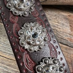 Brown leather bracelet that has a paisley filigree. It is adorned with antique silver Clear crystal conchos. Measures 7.75" to 8.25" with two snaps for adjustment. Lifetime guarantee on all crystals. Adjustable Silver Bedazzled Jewelry, Formal Brown Concho Jewelry, Elegant Concho Jewelry For Festival, Adjustable Bedazzled Formal Jewelry, Turquoise Dog Collar, Poodle Puppy Standard, All Crystals, Jewelry Making Business, Brown Leather Bracelet