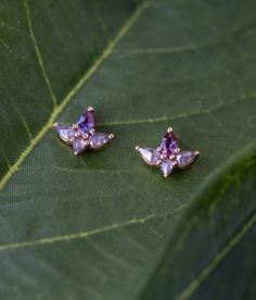 Inspired by the delicate open petals of a flower, these stud earrings exude unrivaled uniqueness, their beauty akin to petals unfurling only at midnight. Each stud earring features .60ct of salt and pepper pear-shaped diamonds paired with .24ct of pear-shaped alexandrite, capturing the soft purples of midnight shadows. Alexandrite Earrings, Soft Purple, At Midnight, Pear Shaped Diamond, Hair Skin, Art Market, Fine Jewellery Earrings, The Body Shop, Stud Earring