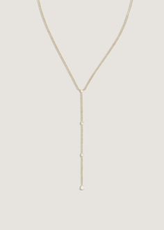 Modern and dainty, this unique lariat necklace features two round, one trillion, and one pear shaped diamond. Perfect for layering or wearing solo, this style effortlessly enhances any neckline. 14k solid gold—always Weight: 2.7g 16-17-18" Adjustable with a 4" Drop Lab Diamonds Carat Weight: 0.45ct Nameplate Bracelet, Silver Pearl Jewelry, Diamond Birthstone, Bridal Engagement Rings, Anniversary Jewelry, Eternity Wedding Band, Domed Ring, Pear Shaped Diamond, Pinky Ring