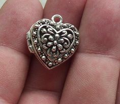 1 Solid Sterling Silver Filigree Heart Locket Pendant Charm Medim and Large sizesMedium.Size: 16.40 mm x 14.60mm x 8.76 mm (3/5 inches x 3/5 inches x 2/5 inches) with jump ringWeight : 3.15 grams.Large:Size: 20 mm x 18 mm x 10 mm (4/5 inches x 3/5 inches x 2/5 inches) with jump ringWeight : 4.70 grams.Description: Solid sterling silver antiquated filigree heart locket pendant charm.  hallmark in inner side. Bears 925Comes without chain or bail. You may choose a bail fit for your  favorite cord o Silver Jewelry With Heart Beads And Round Pendant, Antique Silver Round Beads Jewelry Gift, Antique Silver Round Beads Jewelry For Gift, Heart Shaped Silver Beads Jewelry Gift, Heart Locket Tattoo, Locket Tattoos, Filigree Heart, Locket Charms, Sterling Silver Filigree