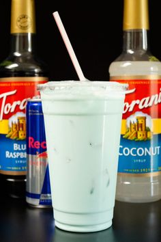 three different types of drinks on a table