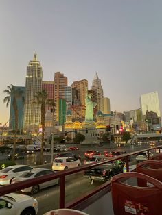 the city skyline is full of tall buildings and palm trees in las vegas, nevada