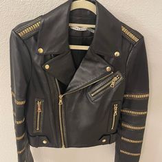 Worn A Couple Of Times. Very Good Condition! Beautiful Soft Lamb Leather Jacket By Alice + Olivia. Adorned With Gold Hardware. Crop Style. No Missing Studs. Just 2 Loose Ones That Can Be Easily Tightened. No Stains On Neck Or Lining. A Small Rubbed Patch On Front, But Not Very Visible At All As You Can See In Pic. Great Piece For The Fall. Sleeve 24 1/2” Shoulder To Bottom 22” Chest 17” Lamb Leather Jacket, Cropped Leather Jacket, Cropped Style, Alice Olivia, Jackets & Coats, Leather Jacket, Jackets For Women, Leather, Black