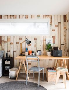 an office with wood paneling on the walls