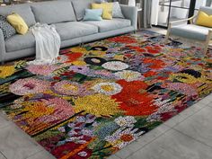 a living room filled with furniture and colorful rugs