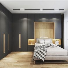 a bed sitting in the middle of a bedroom next to a wall mounted closets