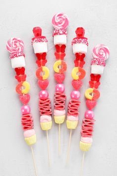 candy lollipops are arranged on top of each other