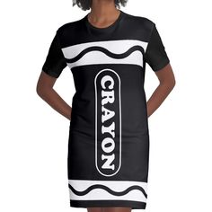 a woman wearing a black and white dress with the word crayon on it