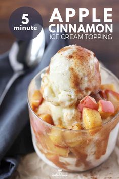 an ice cream sundae with cinnamon topping in a glass bowl on top of a napkin