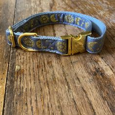 a dog collar on a wooden table