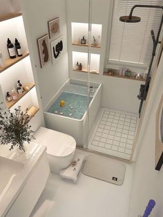 a bathroom with a tub, toilet and sink