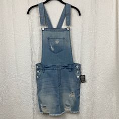 Celebrity Pink Women’s Denim Overall Mini Skirt Nwt Sz Medium Light To Medium Wash Denim Stretch Fabric Adjustable Straps New With Tags 5 Pockets Top Bib To Waist 11.5” Length Waist To Hem 15” Waist 15.5” Hips 17” Length Shoulder To Hem33” Adjustable Excellent Condition! Casual Distressed Mini Bottoms, Casual Ripped Blue Denim Skirt, Spring Distressed Blue Denim Skirt, Pink Skirts, Celebrity Pink, Pocket Top, Pink Skirt, Denim Women, Pink Blue