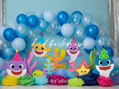 a birthday party with balloons and decorations