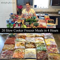 a woman standing in front of a counter full of food and vegetables with the words 20 slow cooker freeze meals in 4 hours