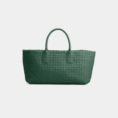 Bottega Veneta "Cabas" tote bag in  intrecciato  lambskin leather  Rolled top handles  Can be worn as a top handle or tote bag Open top Interior, leashed zip pouch bag  Approx. 7.9"H x 13"W x 5.1"D Made in Italy Handheld Woven Leather Bag For Shopping, Handheld Woven Leather Shopping Bag, Shopping Bag With Intrecciato Weave And Double Handle, Woven Leather Bag With Round Handle For Shopping, Top Handle Bag In Woven Leather For Errands, Top Handle Woven Leather Bag For Errands, Woven Leather Top Handle Bag For Shopping, Green Tote Bag With Intrecciato Weave, Green Intrecciato Weave Tote Bag