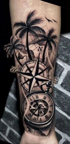 a man's arm with a compass, palm trees and a clock on it