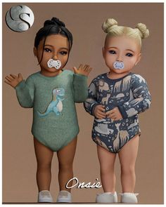 two children wearing bodysuits and pacifiers standing next to each other in front of a brown background