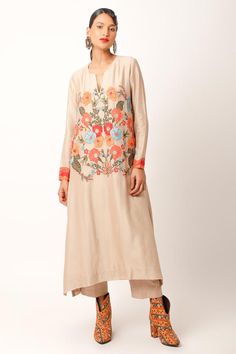 Beige kurta with abstract patch, zari work sleeve borders, multi color floral thread and bead embroidery. Paired with straight fit pant.
Components: 2
Pattern: Embroidered and Printed
Type Of Work: Applique, Thread and Zari Work
Neckline: Notched Round Neck
Sleeve Type: Full Sleeves
Fabric: Silk Chanderi, Cotton Slub
Color: Beige
Other Details: 
Side slits on kurta
Length:
Kurta: 48 inches
Pant: 35 inches
Note: The dupatta worn by the model is not for sale
Occasion: Puja,Mehendi and Haldi - Aza Long Sleeve Palazzo Set With Intricate Embroidery For Festivals, Chanderi Kurta With Embroidered Long Sleeves, Traditional Straight Kurta Sets With Embroidered Sleeves, Designer Palazzo Set With Embroidered Border For Spring, Spring Designer Wear Palazzo Set With Embroidered Border, Spring Designer Palazzo Set With Embroidered Border, Bohemian Sets With Embroidered Sleeves For Festive Occasions, Bohemian Festive Sets With Embroidered Sleeves, Festive Bohemian Sets With Embroidered Sleeves