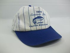 Up for sale is this 1993 Governor Lake Hat  Vintage Blue and White Snapback Baseball Cap Staining around the sweatband, brown discolored stain spots on top of the hat Fish Project, Vintage Bucket Hat, Sporty Cap, White Baseball Hat, Lake Outfit, Vintage Baseball Hats, Cool Baseball Caps, Vintage Baseball Cap, 1950s Hat