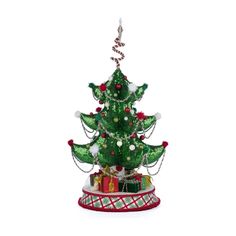 a green christmas tree with presents under it on a white background, surrounded by festive decorations