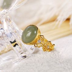 Cocktail Ring-Natural chalcedony egg-faced green rings for women elegant Chinese style charm light luxury ladies opening adjustable jewelry Style: Classic Side Stone: CRYSTAL Shape\pattern: PLANT Setting Type: Tension Setting Rings Type: Cocktail Ring Occasion: Party Model Number: MA075 Metal Material: Silver plating Main Stone: Chalcedony Item Weight: 0.01 Item Type: Rings Gender: Women Fine or Fashion: Fine CertificateType: Third Party Appraisal Certificate Number:3256804277096032 Tension Setting, Party Models, Green Rings, Adjustable Jewelry, Crystal Shapes, Jewelry Style, Stone Crystal, Metal Material, Rings For Women