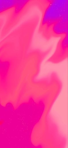 an abstract image of pink and purple colors in the air with white clouds above it