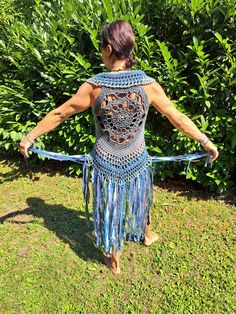 Fitted Bohemian Summer Vest, Summer Bohemian Fitted Vest, Bohemian Fitted Vest For Festival, Fitted Blue Vest For Festival, Fitted Crochet Vest For Summer, Fitted Bohemian Vest For Festivals, Bohemian Fitted Vest For Beach, Blue Sleeveless Vest For Festival, Fitted Sleeveless Vest For Festival