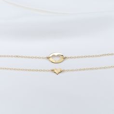 Mother Daughter bracelet set Mother's bracelet: - 14K gold charm is about 14mm x 10mm. - 14K gold 1.3mm cable chain Daughter's bracelet: - 14K gold heart charm is about 8mm x 6mm. - 14K gold 1.3mm cable chain 14K gold components To see other Mother daughter set click here: https://www.etsy.com/shop/SashJewelry?section_id=12441134&ref=shopsection_leftnav_1 To see more children's jewelry click on the link below. http://www.etsy.com/shop/SashJewelry?section_id=12441132 To see more Sash Jewelry Yellow Gold Bracelet With Heart Charm As Gift, Yellow Gold Sterling Silver Heart Bracelet For Anniversary, Hypoallergenic Yellow Gold Heart Pendant Jewelry, Yellow Gold Heart Pendant Bracelet Gift, Yellow Gold Bracelet For Valentine's Day Gift, Yellow Gold Bracelet As Valentine's Day Gift, 14k Yellow Gold Bracelet With Heart Charm, 14k Gold Bracelet With Heart Charm For Anniversary, 14k Gold Bracelet With Heart Charm As Gift