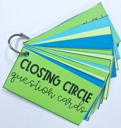 several green and blue cards with the words closing circle on them