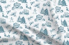 a blue and white christmas pattern with trees, cars, and people in the snow