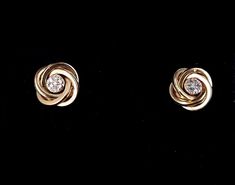 "Vintage 14K Yellow Gold Diamond Petite Twist Flower Design Post Back Earrings .5\" The item up for offer is a lovely pair of vintage 14K yellow gold twist floral earrings. This pair features 7 small diamond stones on each earring. Earrings are post-backs and are marked 14K. Measurements Length: .5\" Width: .5\" Diamond size: 1mm x 1mm x 1mm (.008ct each, .122ct total) Weight: 2.5g / 1.5dwt Condition: Excellent; item is pre-owned and may have some signs of light use. Please look closely at the p 14k Gold Flower Earrings For Formal Occasions, Formal 14k Gold Flower Earrings, 14k Gold Round Flower Earrings For Formal Events, Gold Schmuck, Jewelry Diamond, Jewelry Gemstone, Floral Earrings, Diamond Sizes, Diamond Stone