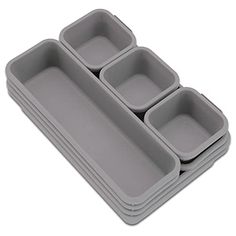 four compartmented trays with compartments on each side