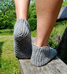 These socks/ slippers are knitted from 50 % wool and 50 % acrylic yarn. These socks are very thick, warm and cozy. These are hand-knitted. Care: These socks can be machine-washable at 30oC / 86oF degrees in wool or fine stage with mild detergent, do not bleach, do not iron, wring at min. Thank you for visiting, Have a great day! Cozy Hand Knitted Slippers With Round Toe, Cozy Hand-knitted Slippers With Round Toe, Cozy Hand-knitted Round Toe Slippers, Cozy Knitted Slippers With Round Toe, Hand Knitted Yarn Slippers For Winter, Hand Knitted Comfortable Yarn Socks, Cozy Chunky Knit Socks, Comfortable Knitted Socks, Cozy Chunky Knit Socks With Round Toe