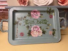 there is a tray that has flowers on it