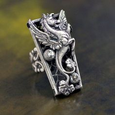 image 0 Silver Fantasy Rings For Collectors, Unique Sterling Silver Ring With Dragon Design, Symbolic Rings With Oxidized Finish For Collectors, Eagle Wings, Slide Bracelet, Dragon Ring, Jewelry Cleaning Solution, Medieval Jewelry, Mythical Creature