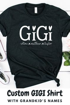 Super cute, unisex shirt with the word, Gigi and grandkids names below with adorable hearts. Great t-shirt for a Gigi birthday gift, Mothers Day gift, or a New Grandma gift. #giftforgigi #shirtforgigi #personalizedgigishirt #gigishirtwithkidsnames #gigishirtwithgrandkidsnames #customgigishirt #gigishirtwithnames #gigibirthdayidea #grandmashirt #shirtforgrandma #shirtwithgrandkidsnames Gigi Birthday, Gifts For New Grandma, Grandma Birthday Gift, New Grandma Gift, Cricut Templates, T Shirt Sewing Pattern, Gigi Gift, Gigi Shirts, Grandmas Mothers Day Gifts