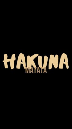 the words hakuna matata are written in brown and white ink on a black background