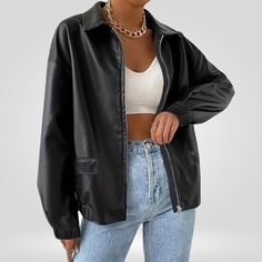 Women's Oversized Black Leather Bomber Jacket | Handmade Vintage Style Black Bomber Jacket for Women | Best Gift for Her A women's black oversize biker leather jacket is a stylish and trendy outerwear piece that combines the classic design of a biker jacket with a modern twist of an oversized fit. This type of jacket is popular among women who want to make a bold fashion statement while also enjoying the comfort and functionality of a leather jacket. Women's black oversize biker leather jackets Oversized Black Leather Jacket In Edgy Style, Casual Oversized Black Leather Jacket, Oversized Black Edgy Biker Jacket, Oversized Biker Leather Jacket For Fall, Oversized Black Biker Jacket, Oversized Black Biker Jacket With Long Sleeves, Black Oversized Leather Jacket, Oversized Black Leather Jacket, Trendy Outerwear