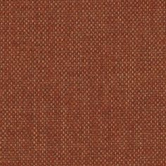 an orange and brown fabric textured with small dots on the outside, as if it is