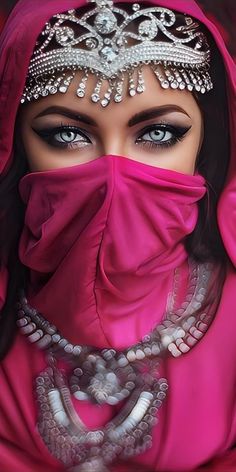 a woman wearing a pink veil and jewelry